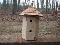 Fancy Bird House- house has 4 nesting compartments and hinges for easy clean out