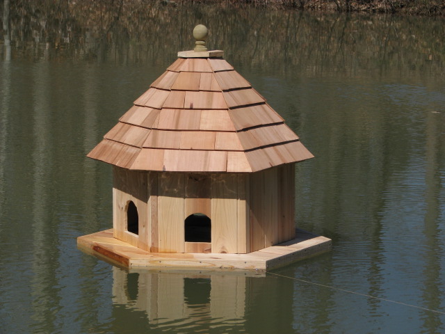 3' Floating Duck Nesting Box with 4 nesting compartments on a 5' hexagon floating platform. Made from cypress with cedar shake roof---$1,200.00 plus shipping 